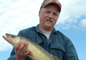 Fisherman with Walleye